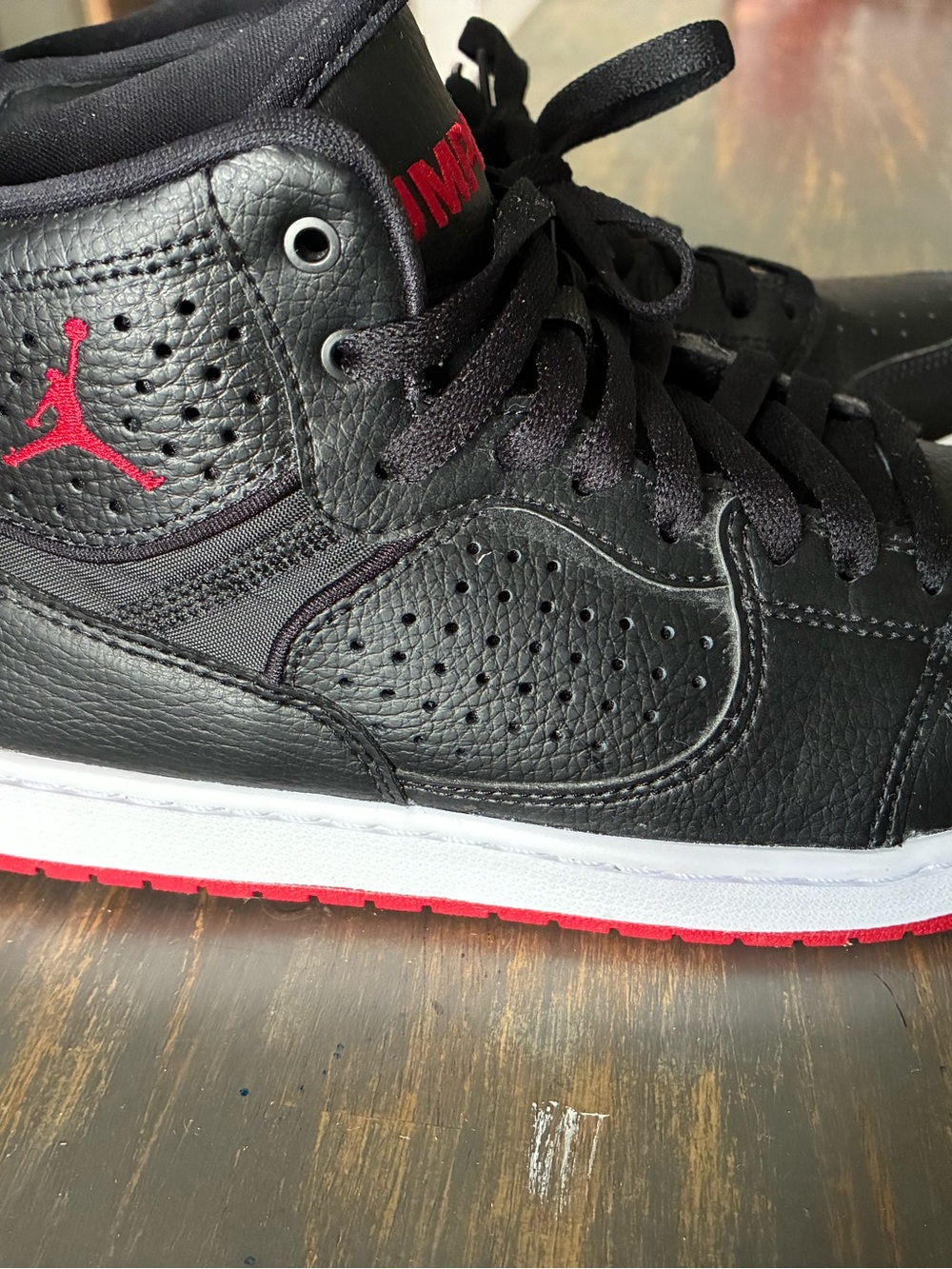 Jordan Mens Black and Red High-Top Sneakers